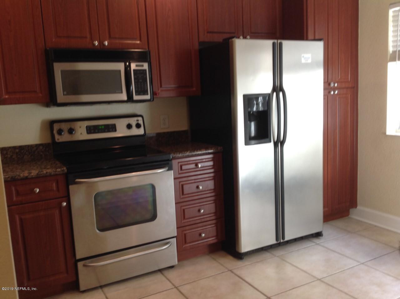 9745 Touchton Road, Unit 829 Jacksonville, FL 32246 - Photo 8 of 11 Stainless/Granite Kitchen