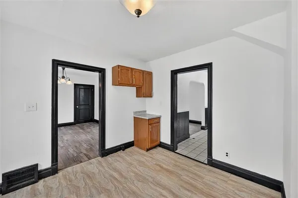 a bedroom with a bed and a sink