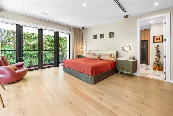 a bathroom with a bathtub and window