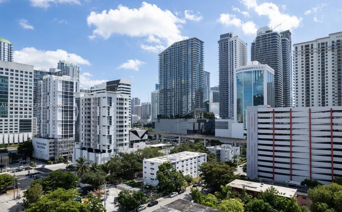 143 Southwest 9th Street, Unit 301 Miami, FL 33130 - Photo 16 of 16 a view of a city with tall buildings
