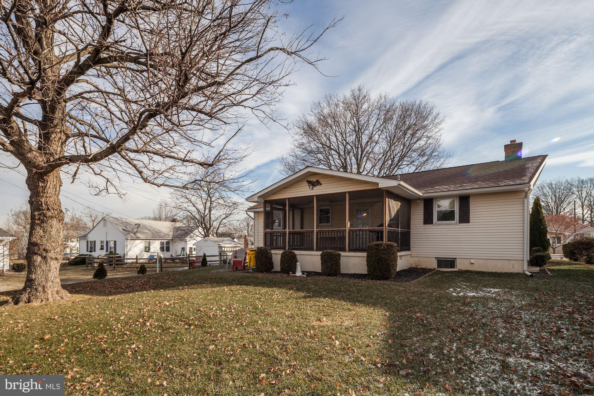 702 Edgewood Road Linthicum Heights, MD 21090 - Photo 20 of 21 a view of a street with a large tree