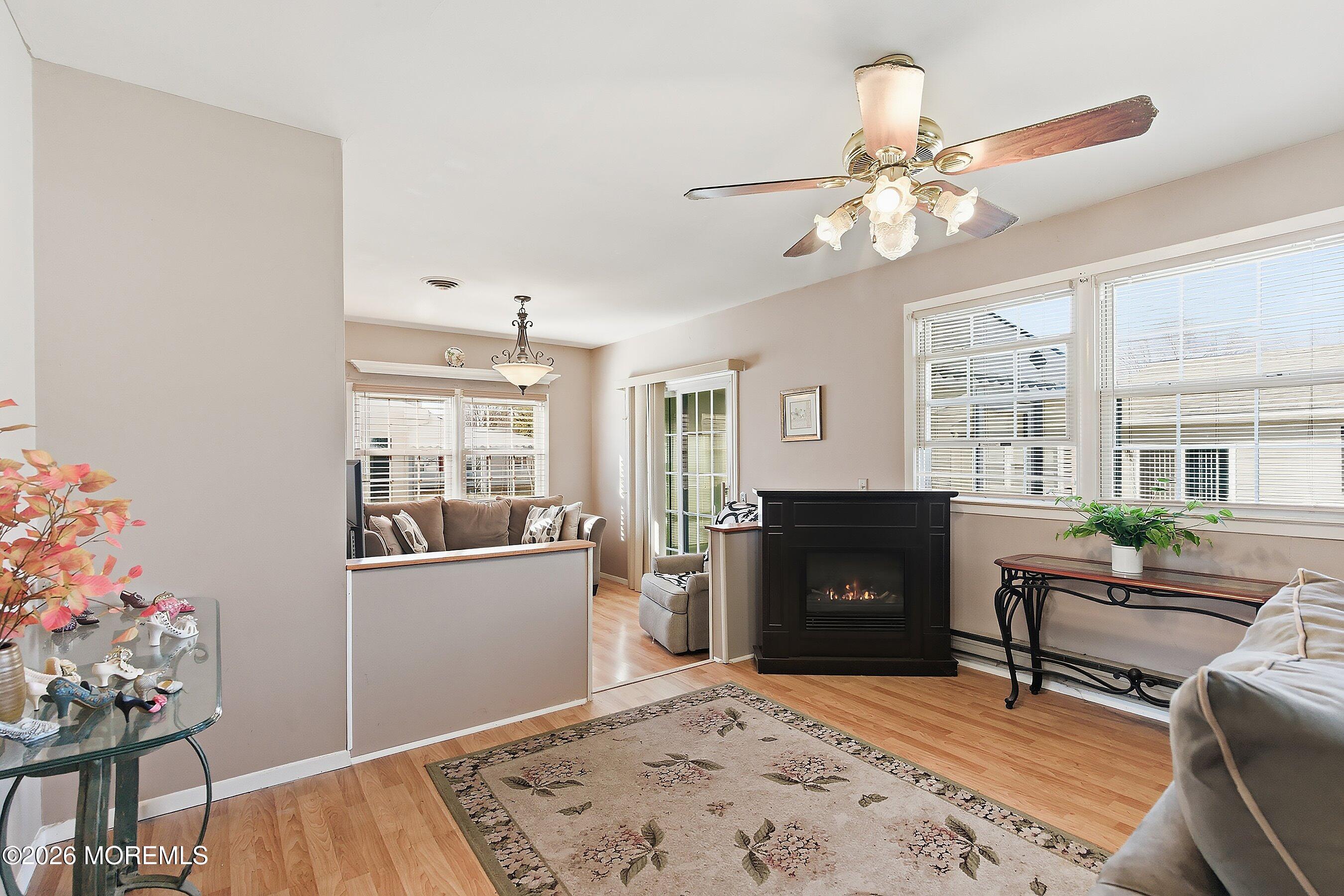 56 South Chestnut Avenue Whiting, NJ 08759 - Photo 11 of 44 a living room with furniture and a fireplace
