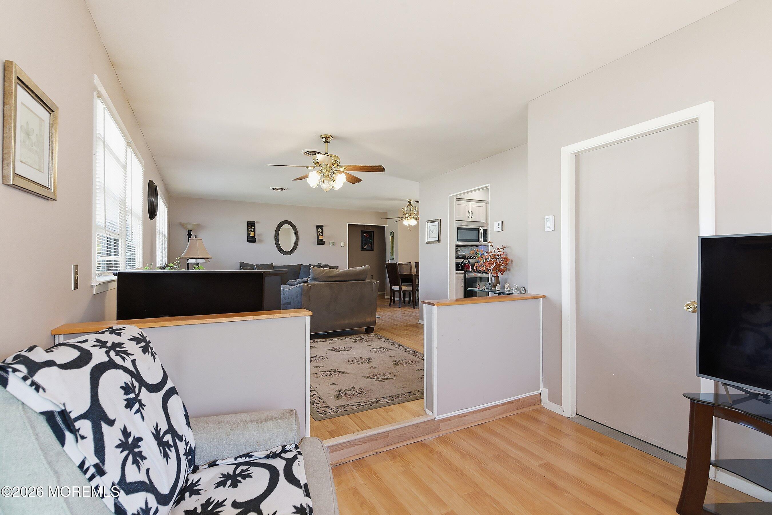 56 South Chestnut Avenue Whiting, NJ 08759 - Photo 14 of 44 a living room with furniture and a flat screen tv