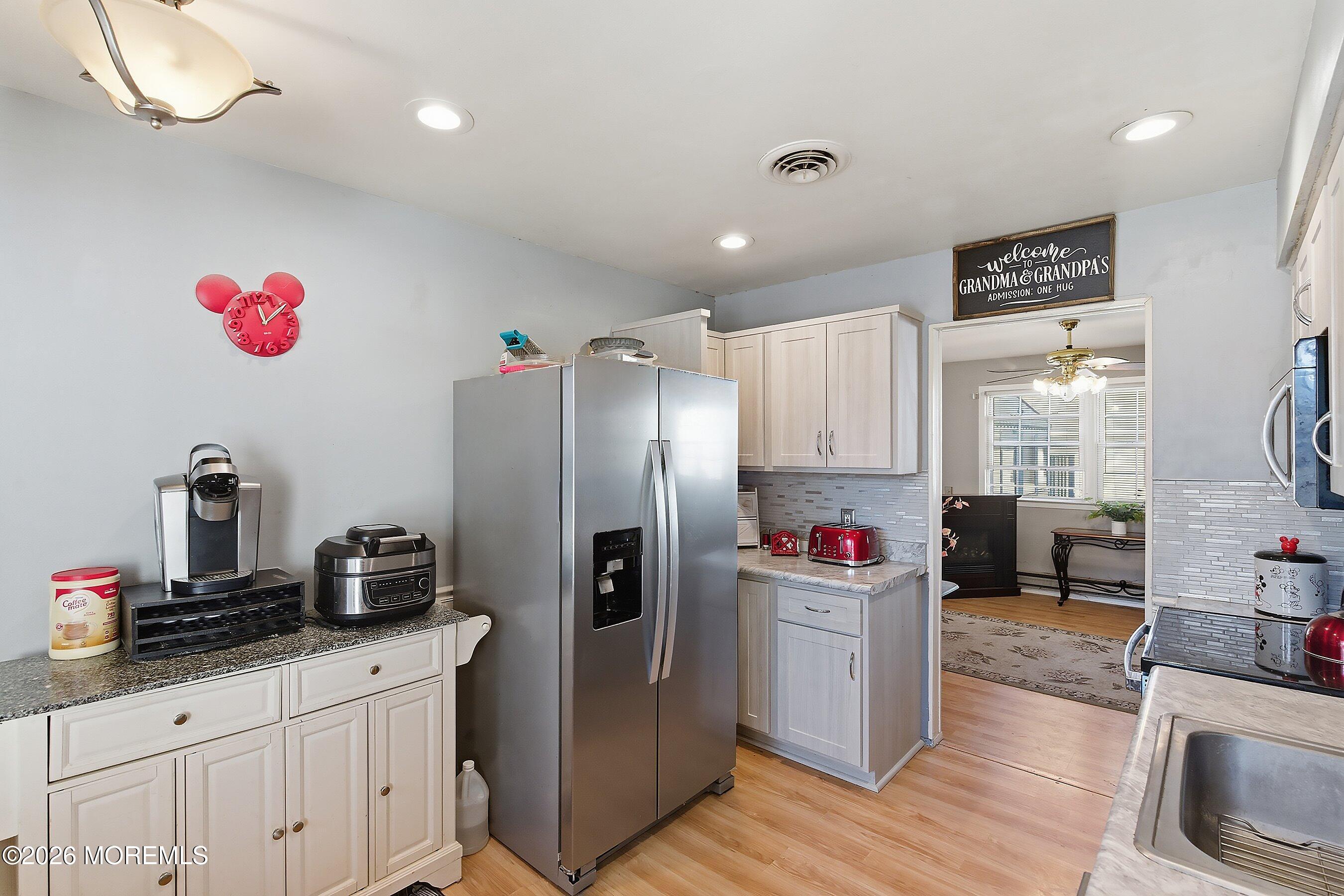 56 South Chestnut Avenue Whiting, NJ 08759 - Photo 15 of 44 a kitchen that has a lot of cabinets a sink and appliances