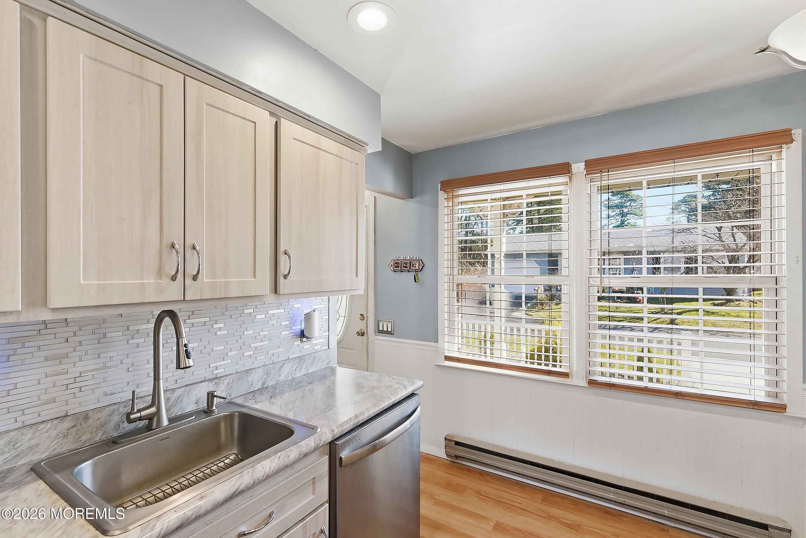 56 South Chestnut Avenue Whiting, NJ 08759 - Photo 18 of 44 a kitchen that has a sink and a window