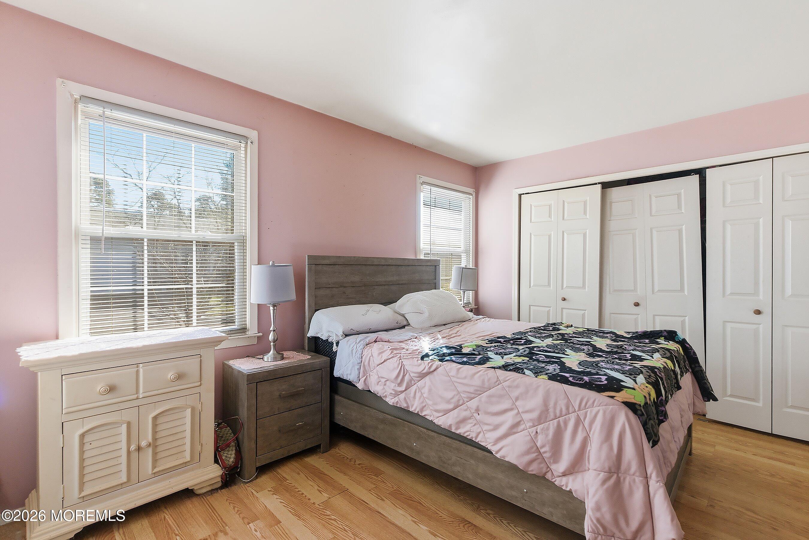 56 South Chestnut Avenue Whiting, NJ 08759 - Photo 22 of 44 a bedroom with a bed next to a window with dresser