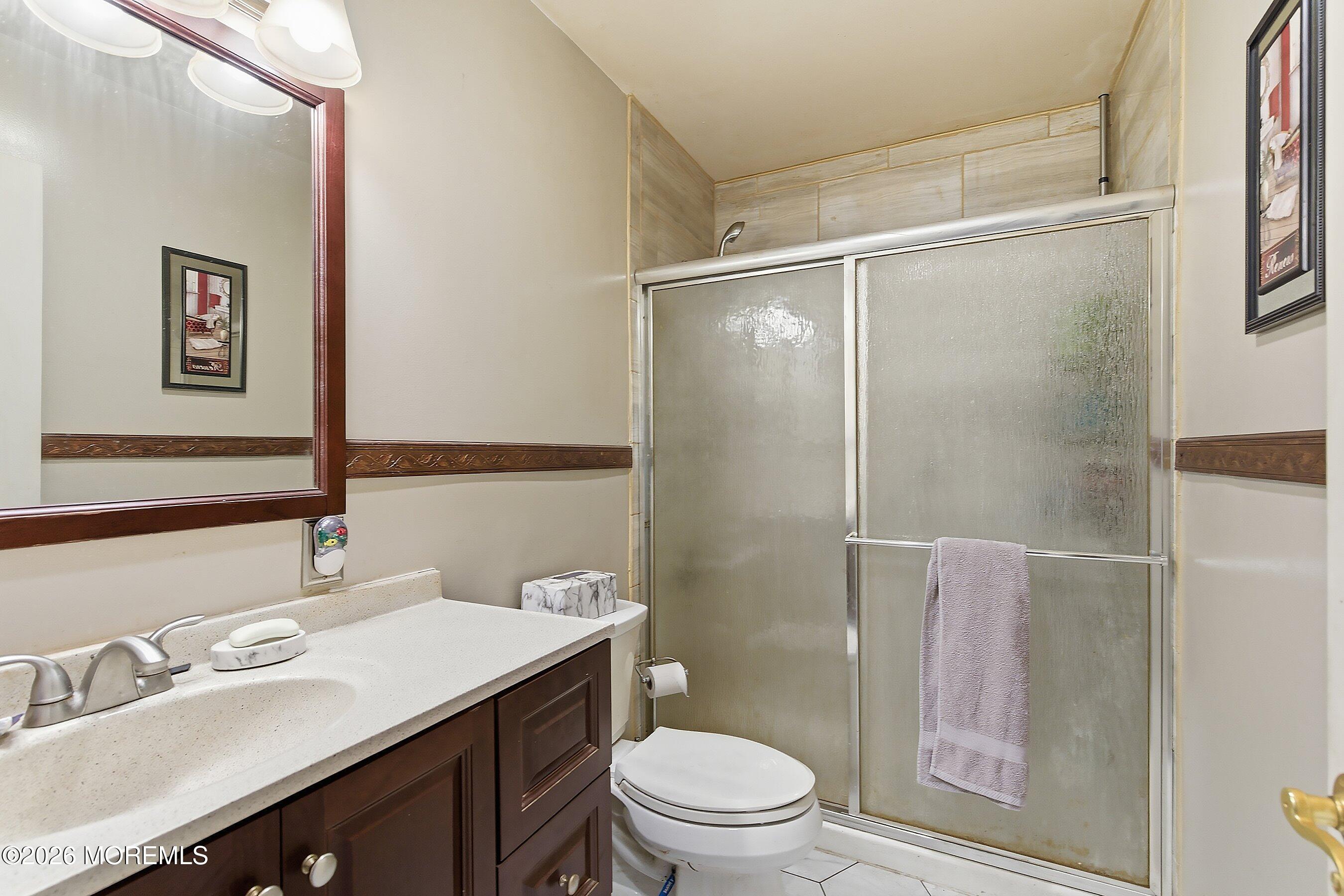 56 South Chestnut Avenue Whiting, NJ 08759 - Photo 23 of 44 a bathroom with a sink toilet and shower