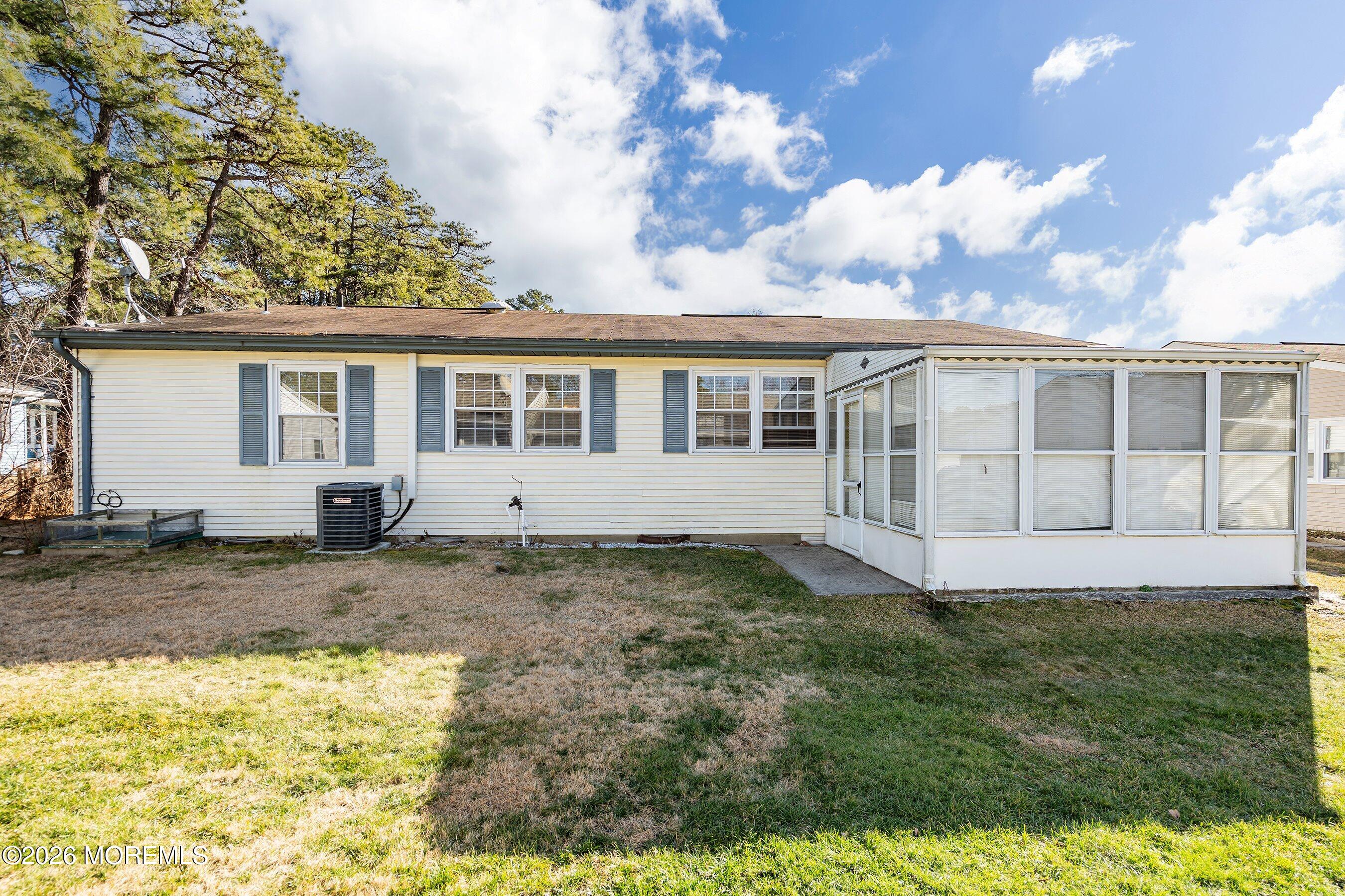 56 South Chestnut Avenue Whiting, NJ 08759 - Photo 25 of 44 a view of a house with backyard and sitting area