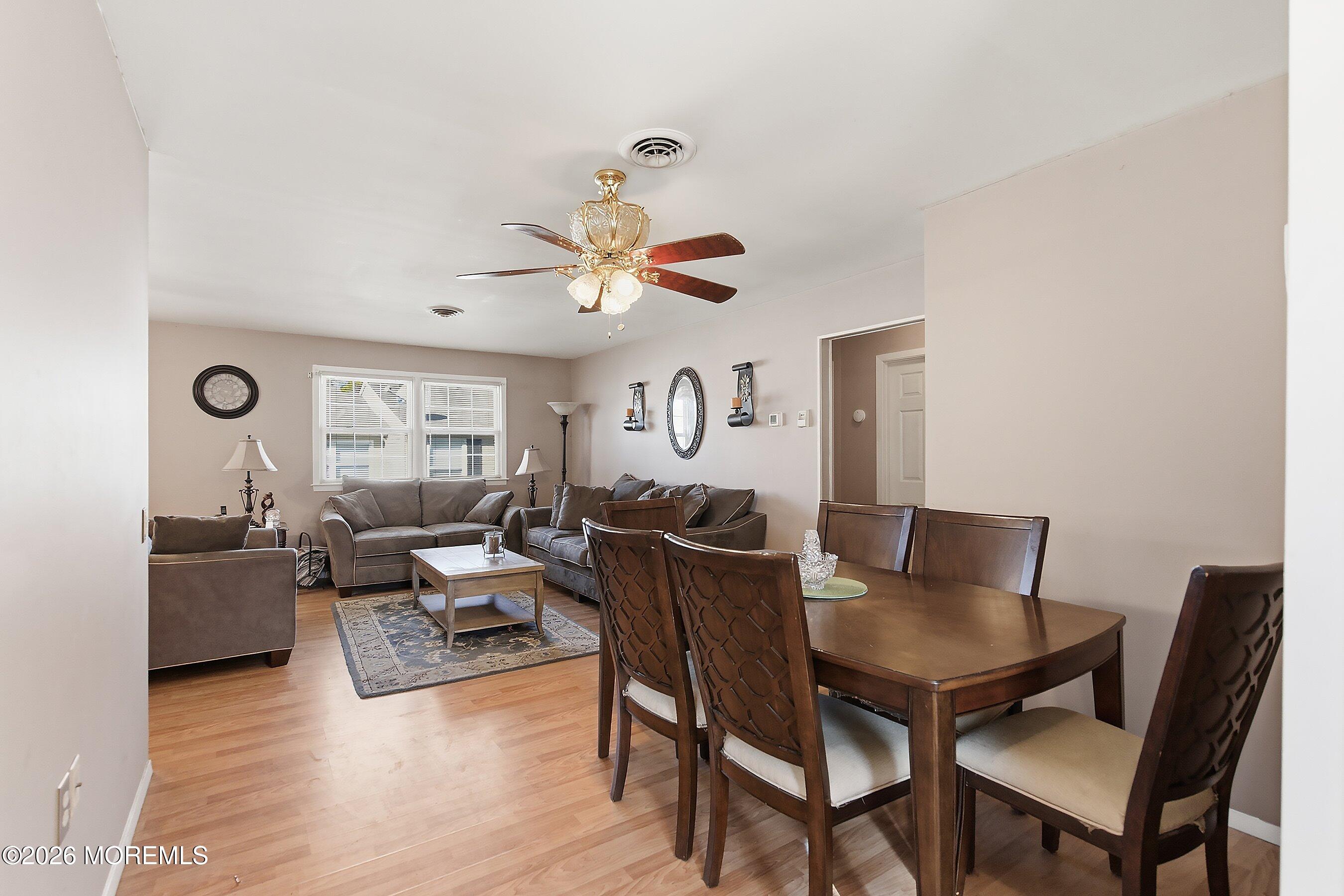 56 South Chestnut Avenue Whiting, NJ 08759 - Photo 4 of 44 a living room with furniture kitchen view and a dining table