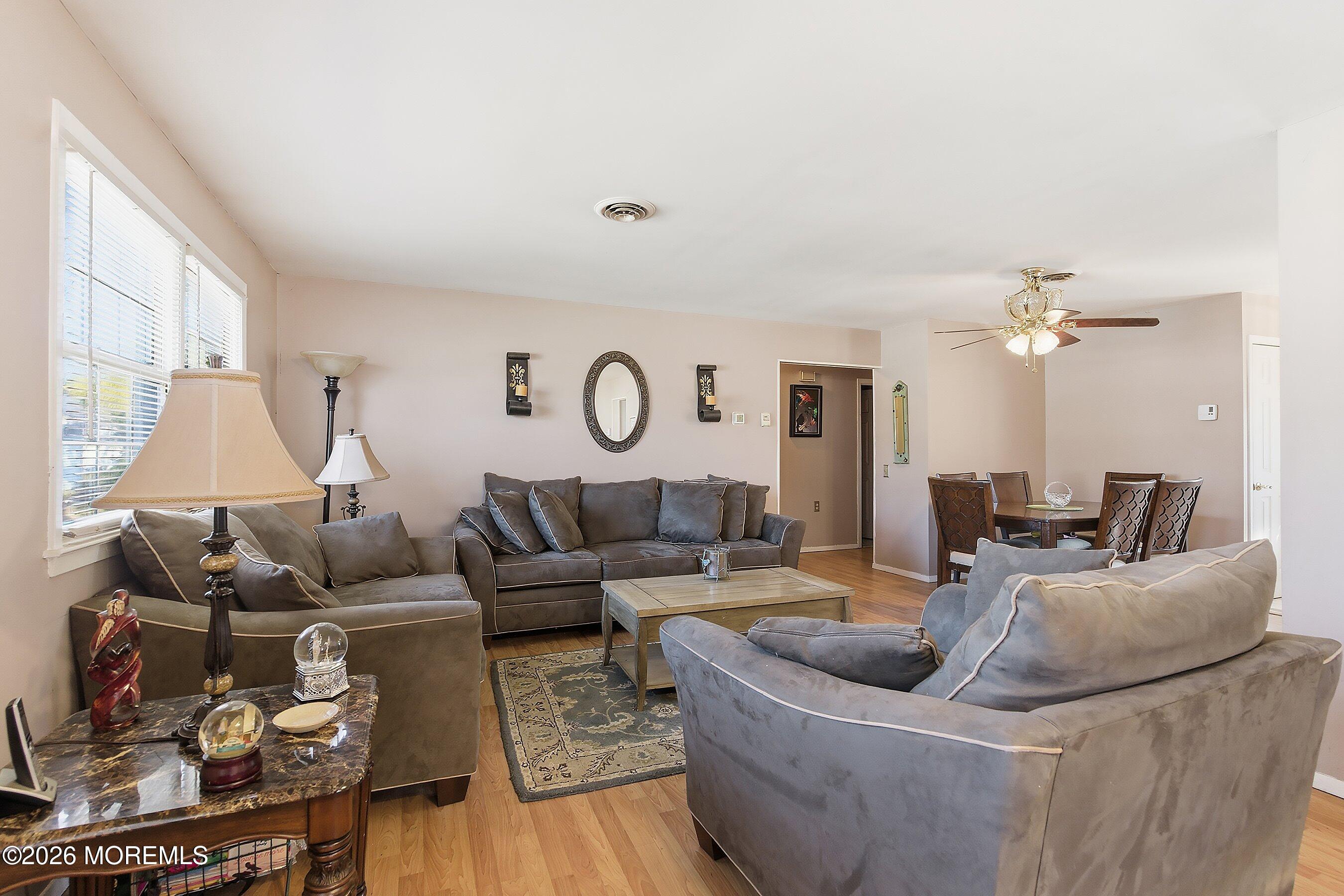 56 South Chestnut Avenue Whiting, NJ 08759 - Photo 7 of 44 a living room with furniture and a large window