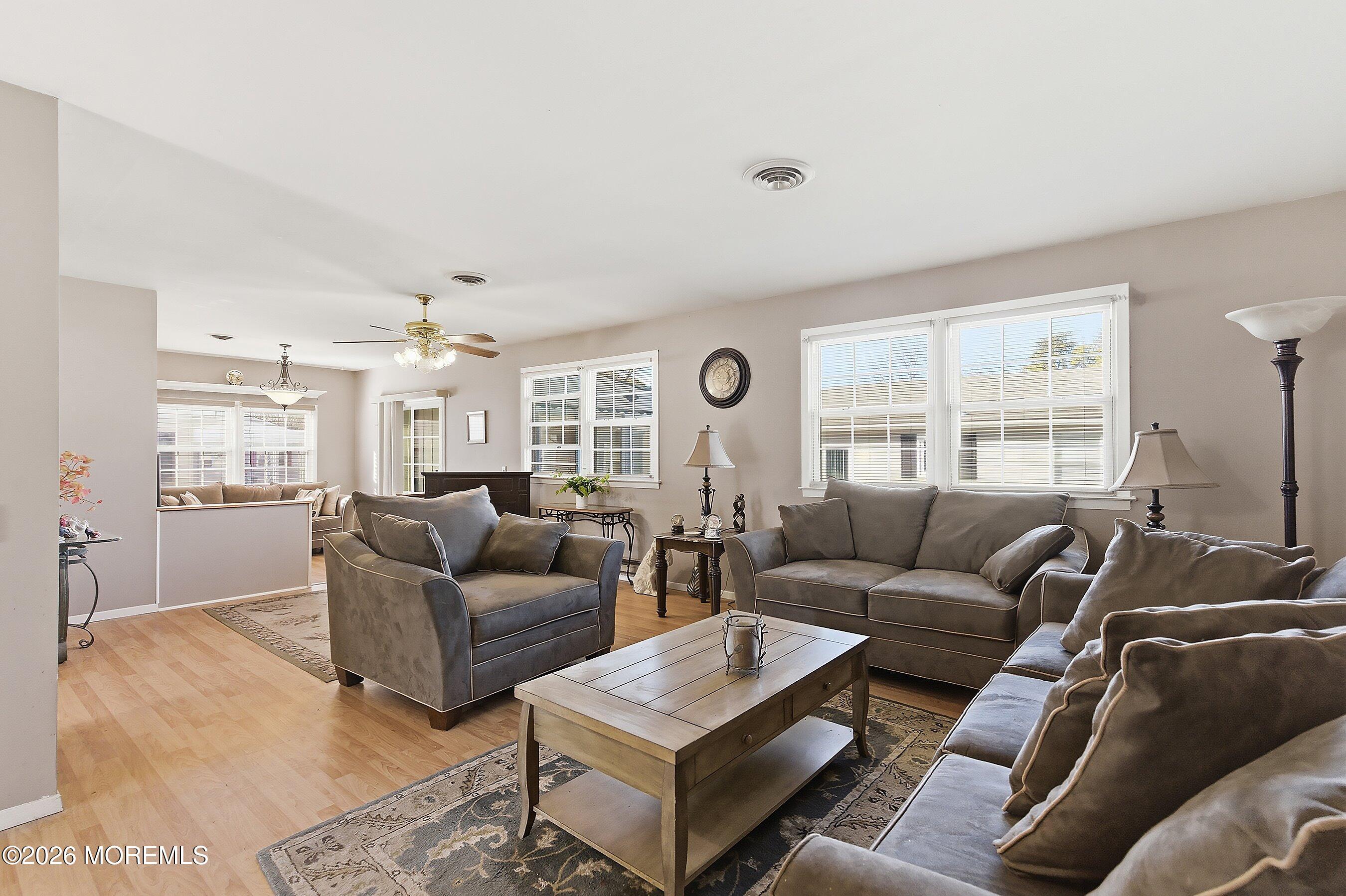 56 South Chestnut Avenue Whiting, NJ 08759 - Photo 9 of 44 a living room with furniture and a large window