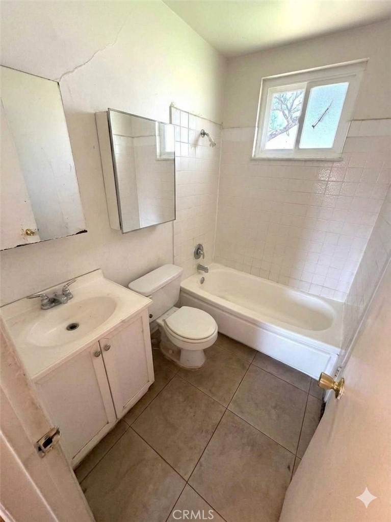 8868 Randolph Street Riverside, CA 92503 - Photo 10 of 21 Original Photo of Bathroom #1, AI digitally altered to remove debris