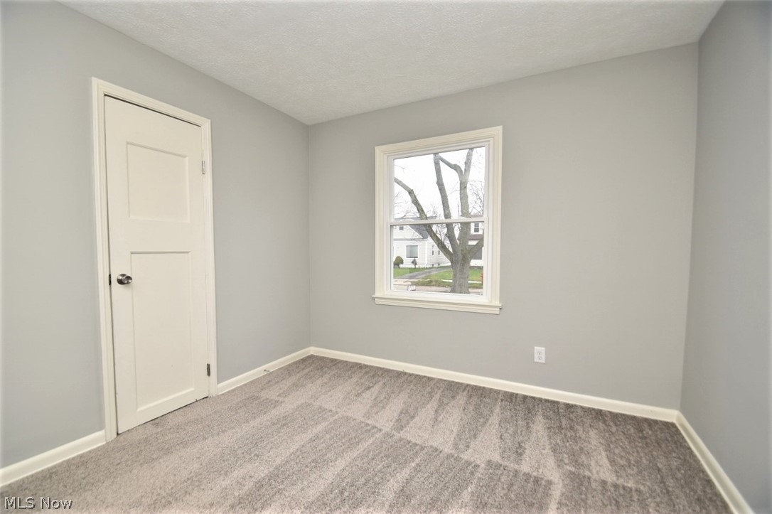 21012 Hansen Road Maple Heights, OH 44137 - Photo 16 of 28 Front bedroom has a spacious closet
