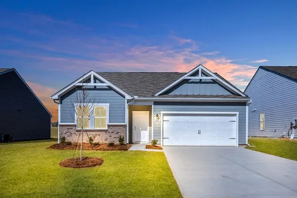 a front view of house with yard