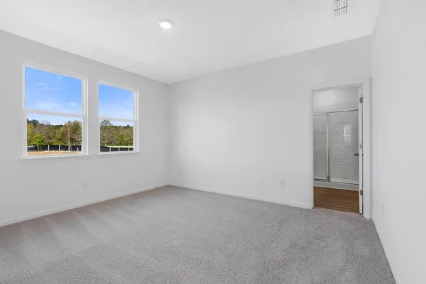 an empty room with windows