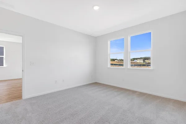 an empty room with windows