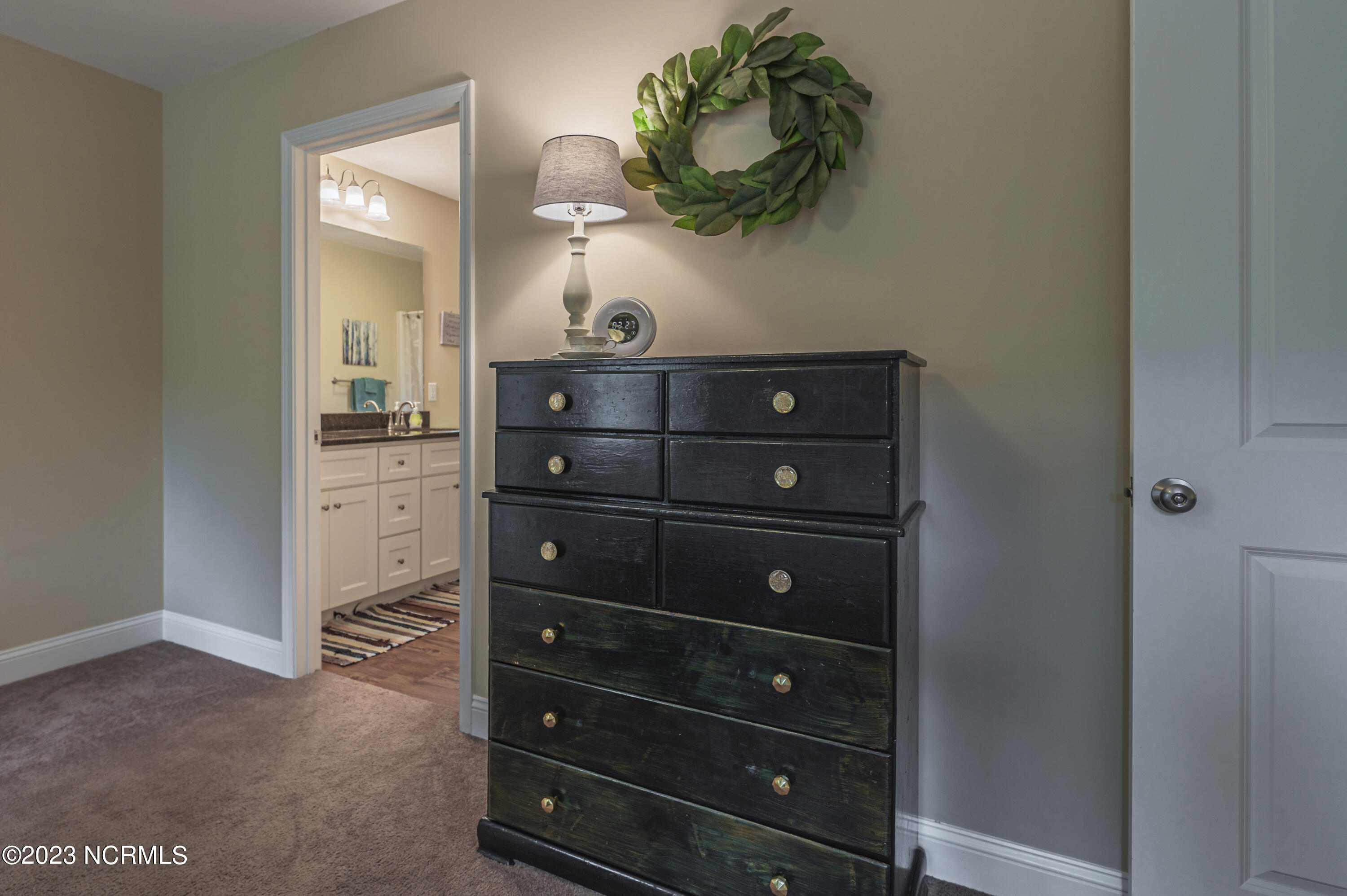172 Midway Road Aberdeen, NC 28315 - Photo 17 of 36 Master Bedroom, bathroom door