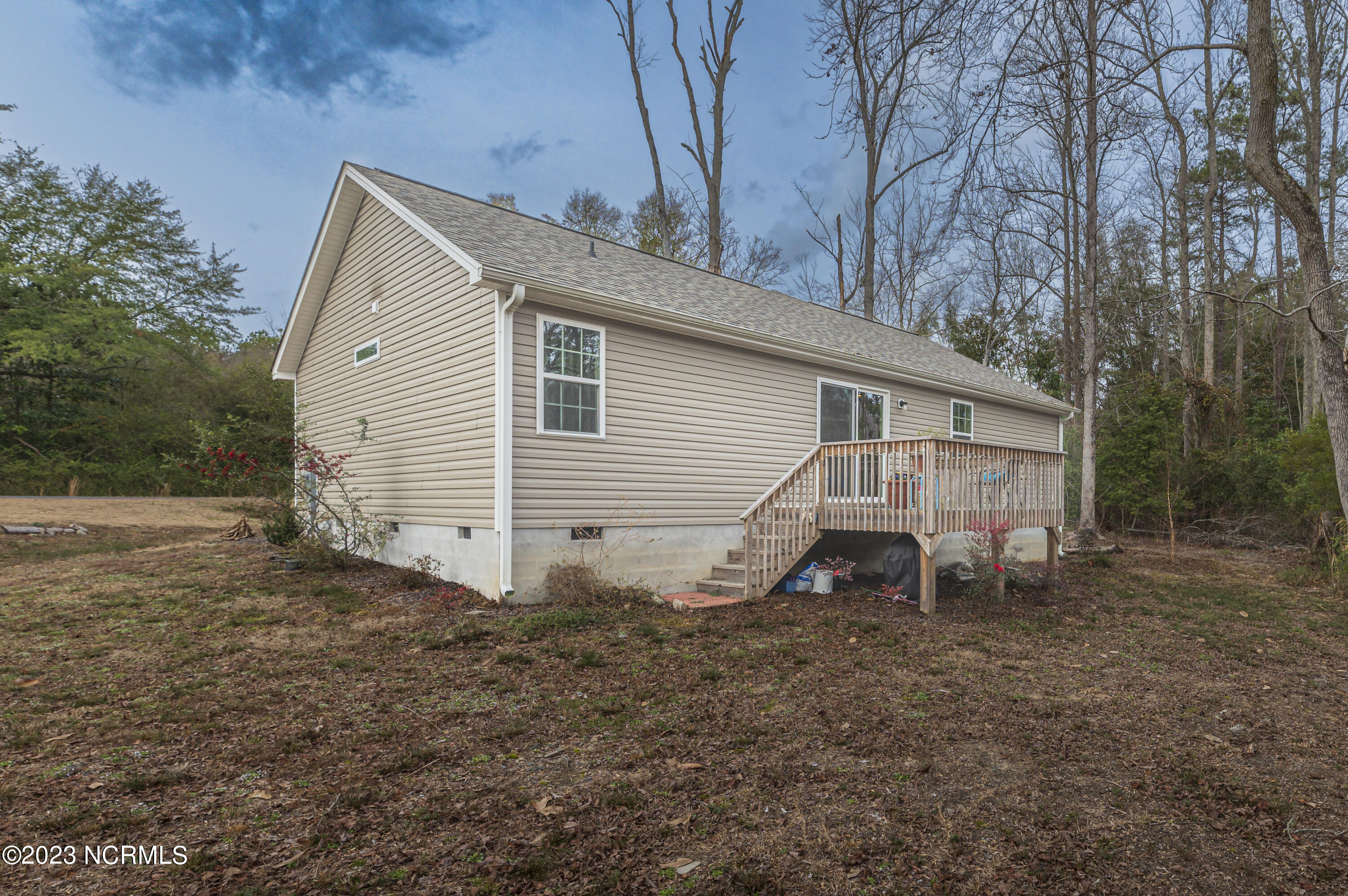 172 Midway Road Aberdeen, NC 28315 - Photo 33 of 36 Backyard view of deck