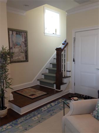 169 HMS Halsted Drive, Unit 169 Hingham, MA 02043 - Photo 22 of 26 a living room with furniture and wooden floor