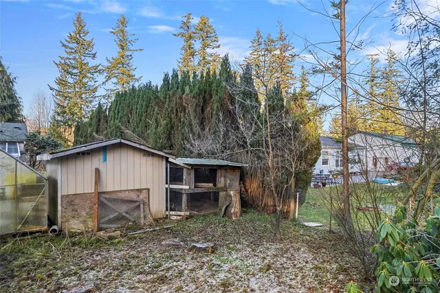 a view of backyard of house