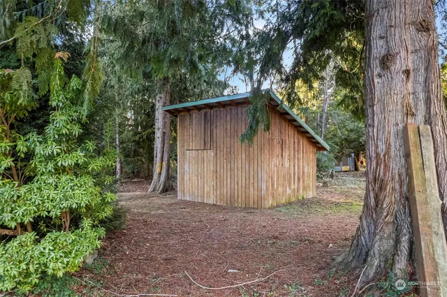 a backyard of a house with lots of green space