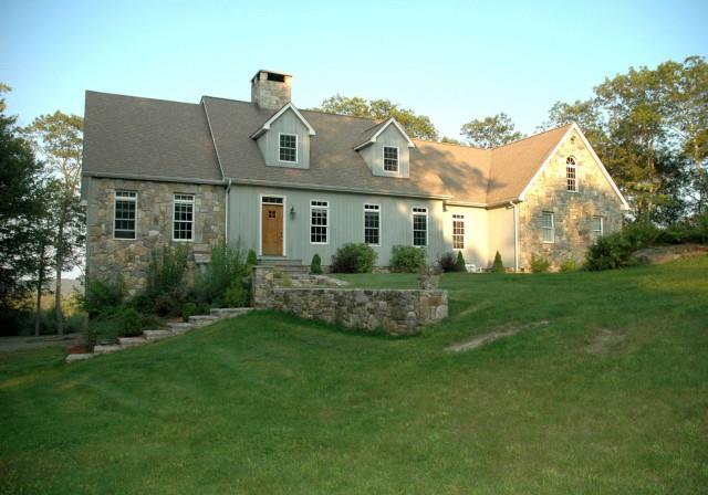 38 Iron Mountain Road Kent, CT 06757 - Photo 1 of 1 a front view of house with garden