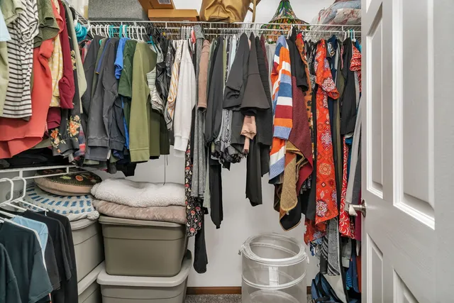 a bathroom with a toilet sink and curtain