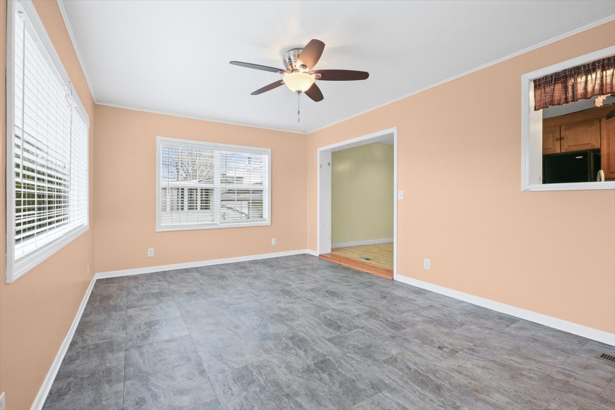 1513 Gates Drive Rantoul, IL 61866 - Photo 16 of 37 wooden floor in an empty room with a window