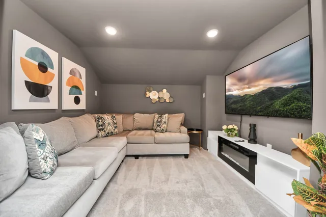 a living room with furniture and a table