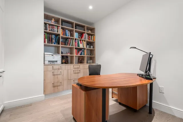 a view of a workspace with furniture