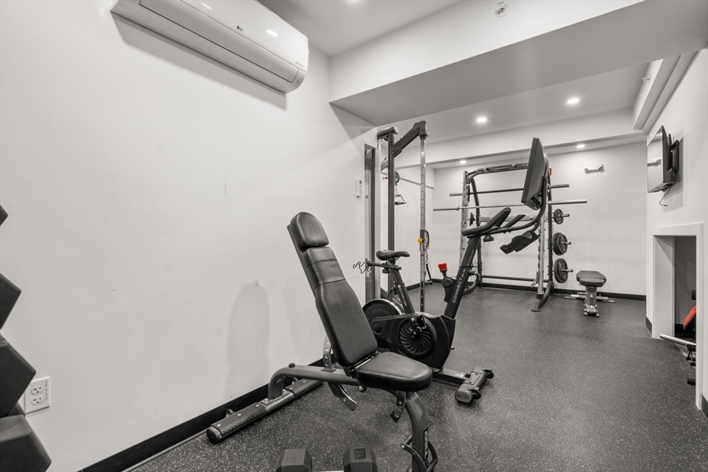 69 Walnut Street, Unit 4/5 Brookline, MA 02445 - Photo 23 of 26 a view of a room with gym equipment