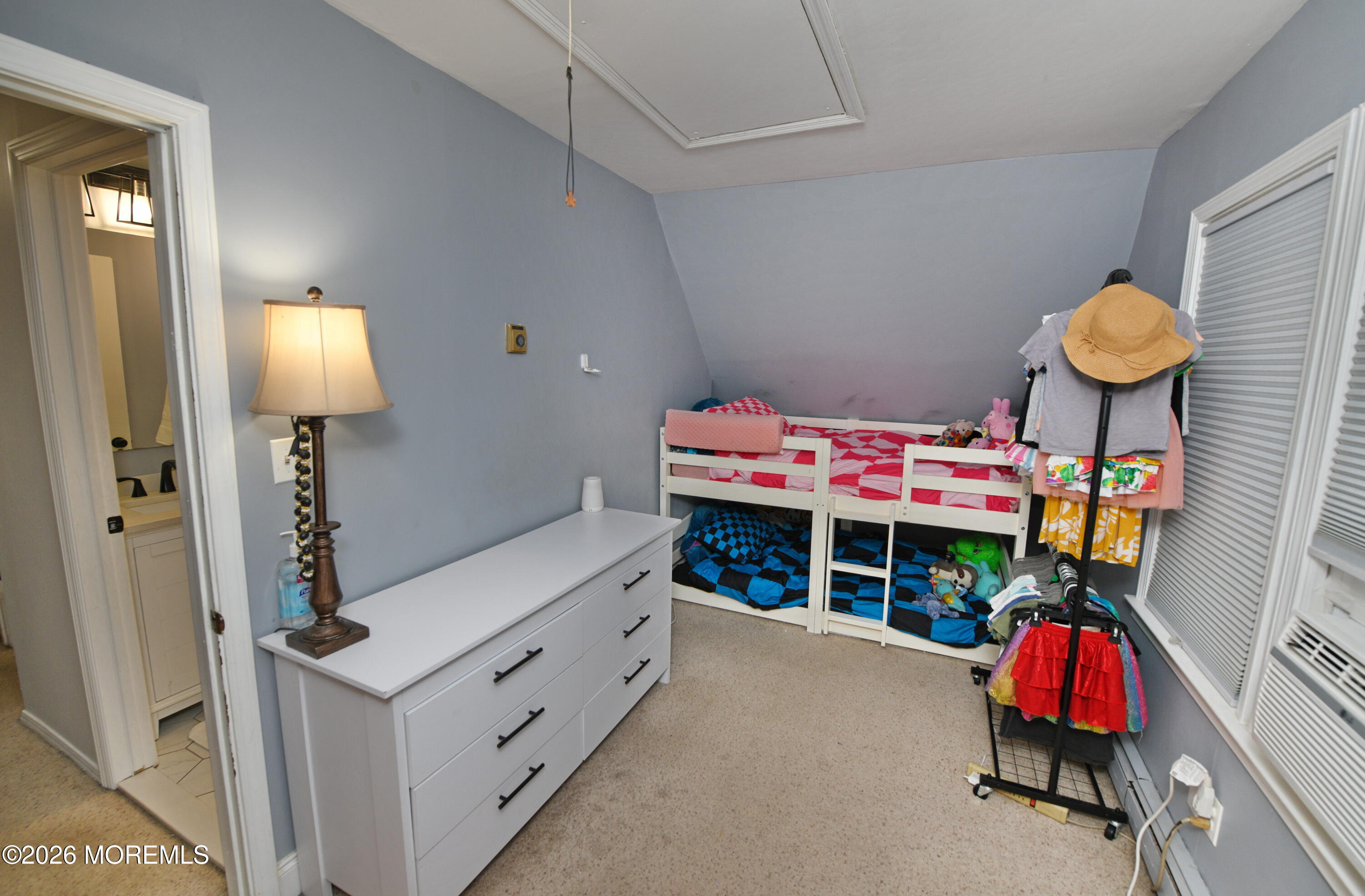 232 Pearce Avenue Point Pleasant, NJ 08742 - Photo 16 of 27 a bedroom with furniture and a bed