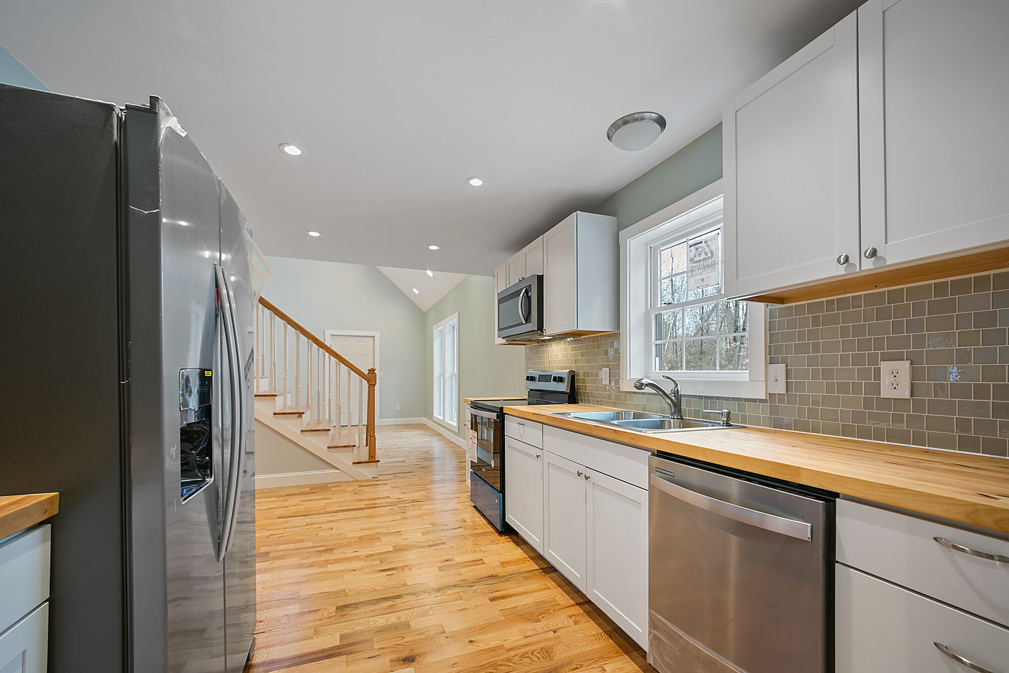 69 Canaan Road Clinton, ME 04927 - Photo 10 of 25 Kitchen to Living Room