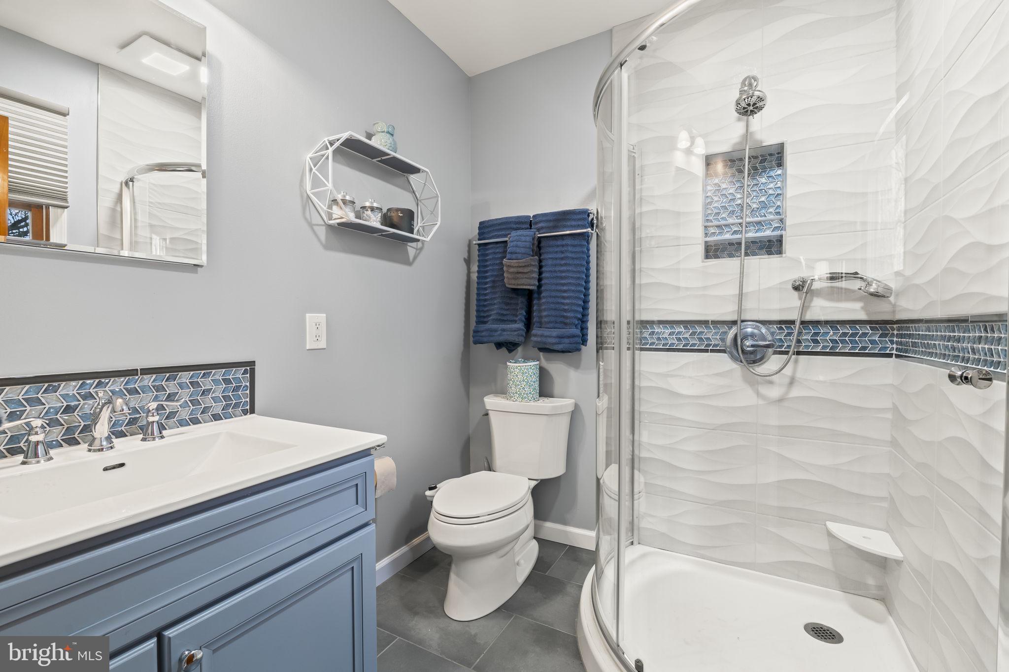 4901 Reedman Avenue Bensalem, PA 19020 - Photo 28 of 55 a bathroom with a sink a toilet and shower