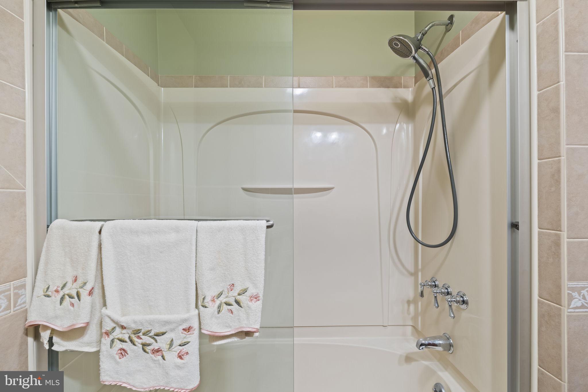 4901 Reedman Avenue Bensalem, PA 19020 - Photo 34 of 55 a bathroom with a bathtub and shower