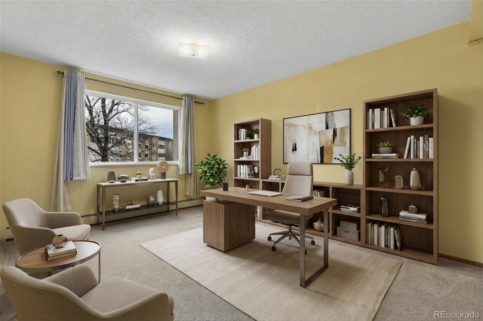 9155 Center Avenue, Unit 3B Denver, CO 80247 - Photo 16 of 50 a work room with furniture and a window