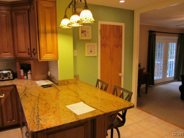 1909 Dartford Road Bethlehem, PA 18015 - Photo 13 of 21 a dining table with a chandelier