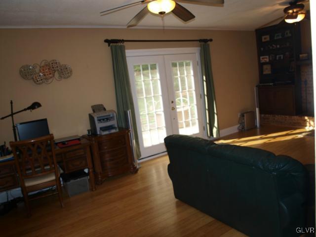 1909 Dartford Road Bethlehem, PA 18015 - Photo 16 of 21 a living room with furniture and a chandelier