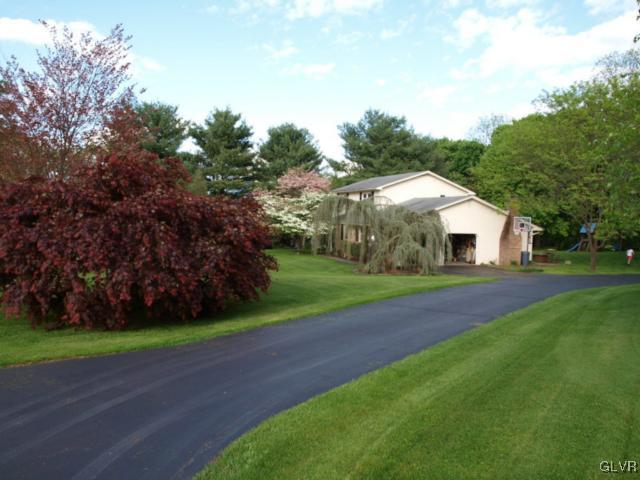 1909 Dartford Road Bethlehem, PA 18015 - Photo 4 of 21 a front view of house with yard and green space