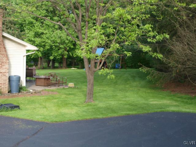 1909 Dartford Road Bethlehem, PA 18015 - Photo 6 of 21 a view of a backyard with large trees