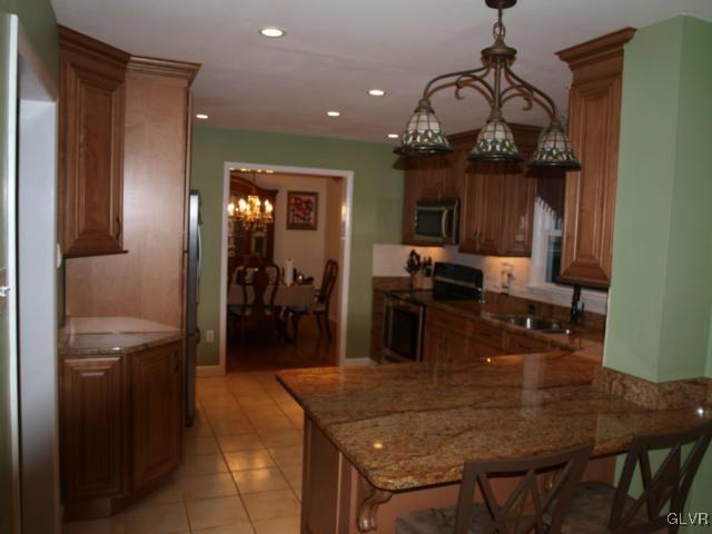 1909 Dartford Road Bethlehem, PA 18015 - Photo 8 of 21 a kitchen with a table and chairs in it