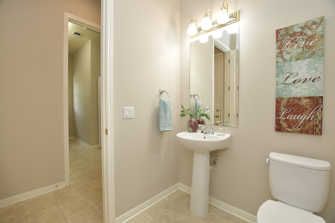120 Golf View Drive Georgetown, TX 78633 - Photo 17 of 32 Located just off the kitchen/family room, the powder room is convenient when entertaining.