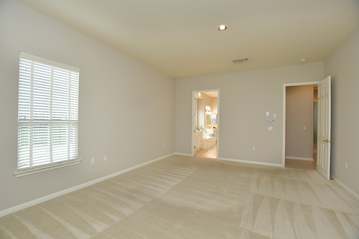 120 Golf View Drive Georgetown, TX 78633 - Photo 20 of 32 An adjoining en-suite bath is found off the primary bedroom.
