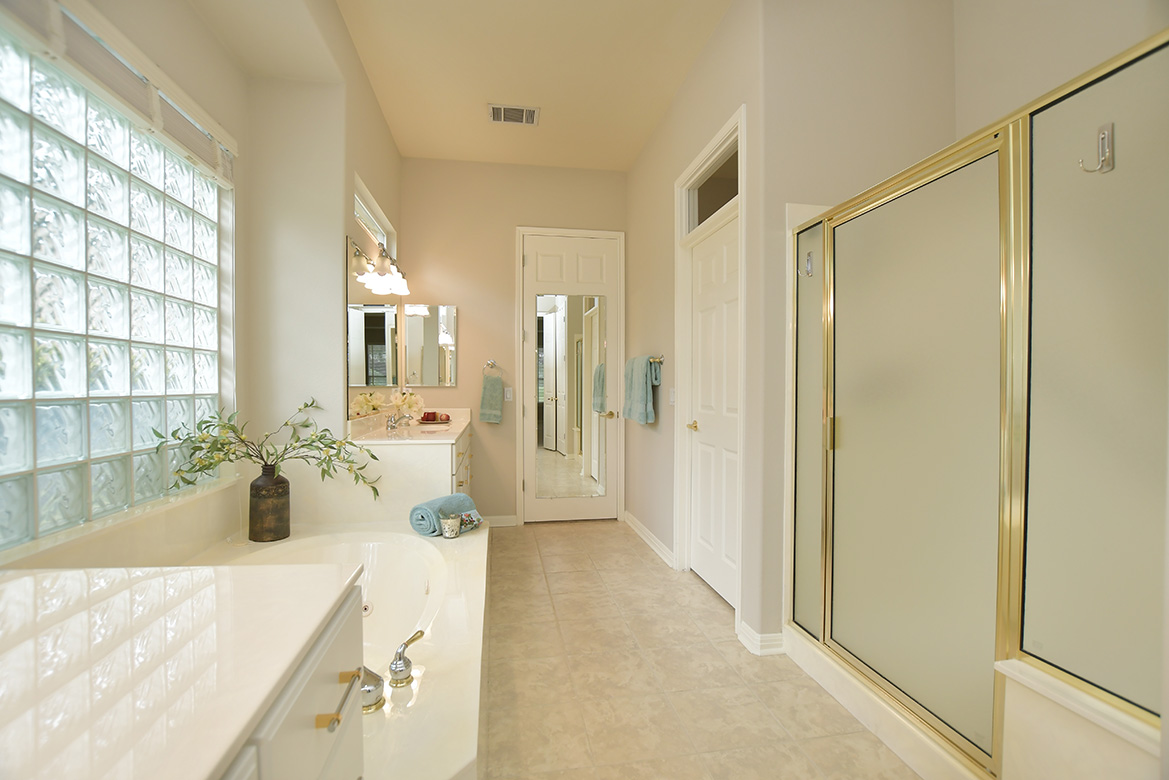 120 Golf View Drive Georgetown, TX 78633 - Photo 23 of 32 Dual closets are found in the primary bathroom.