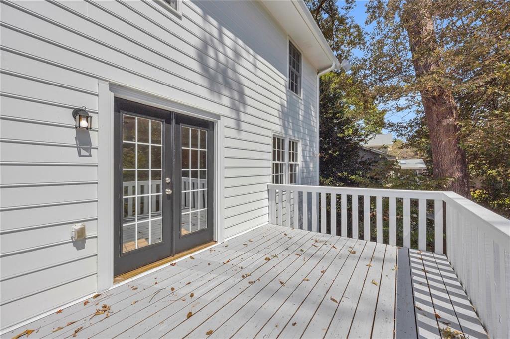 4872 Arrowhead Trail W Southwest Lilburn, GA 30047 - Photo 16 of 44 a view of wooden deck