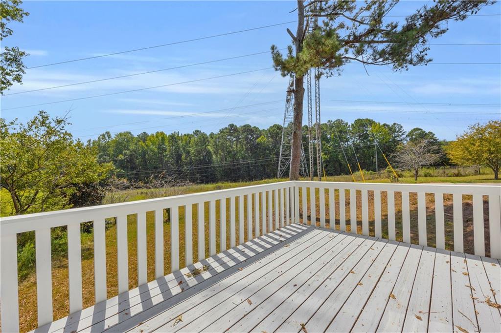 4872 Arrowhead Trail W Southwest Lilburn, GA 30047 - Photo 18 of 44 a view of a wooden bridge