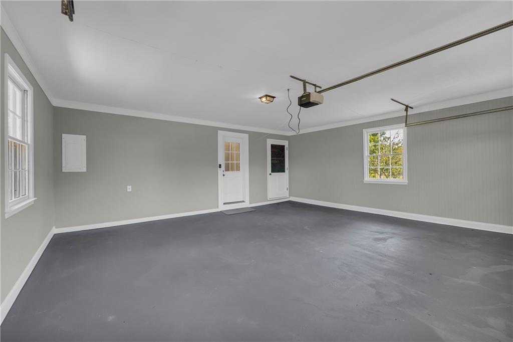 4872 Arrowhead Trail W Southwest Lilburn, GA 30047 - Photo 21 of 44 a view of an empty room with a window