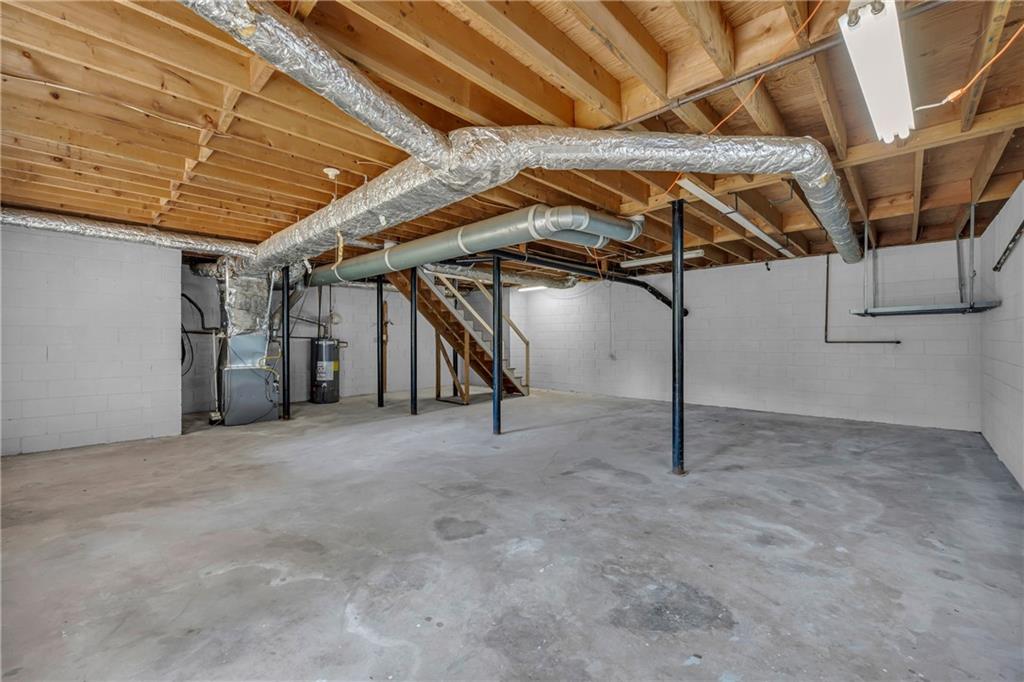 4872 Arrowhead Trail W Southwest Lilburn, GA 30047 - Photo 34 of 44 a view of an empty room