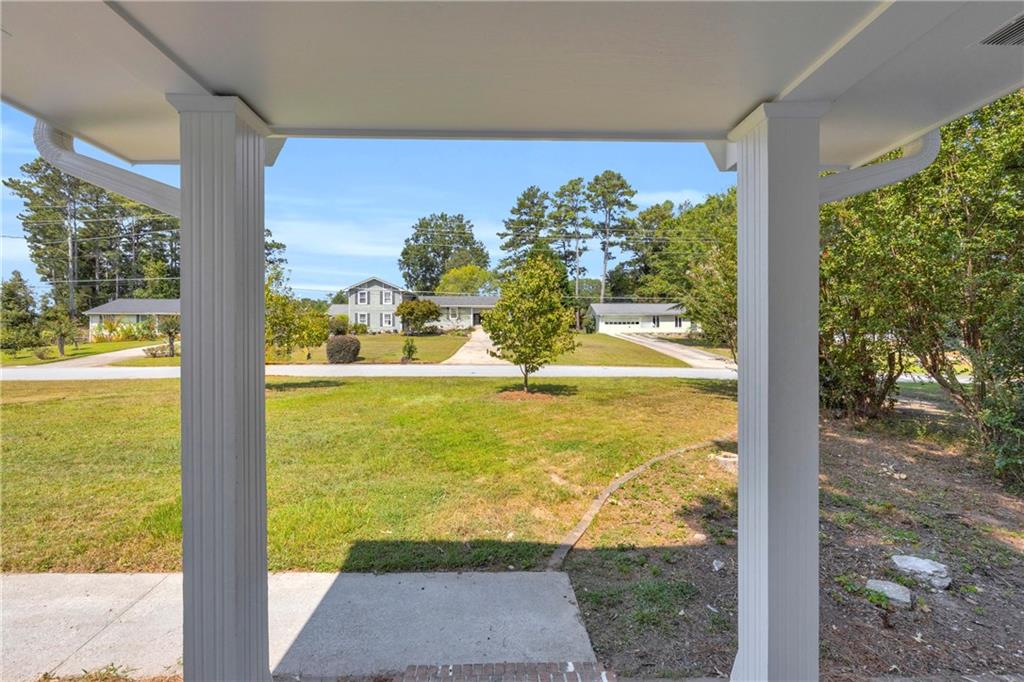 4872 Arrowhead Trail W Southwest Lilburn, GA 30047 - Photo 4 of 44 a view of a room with an outdoor space
