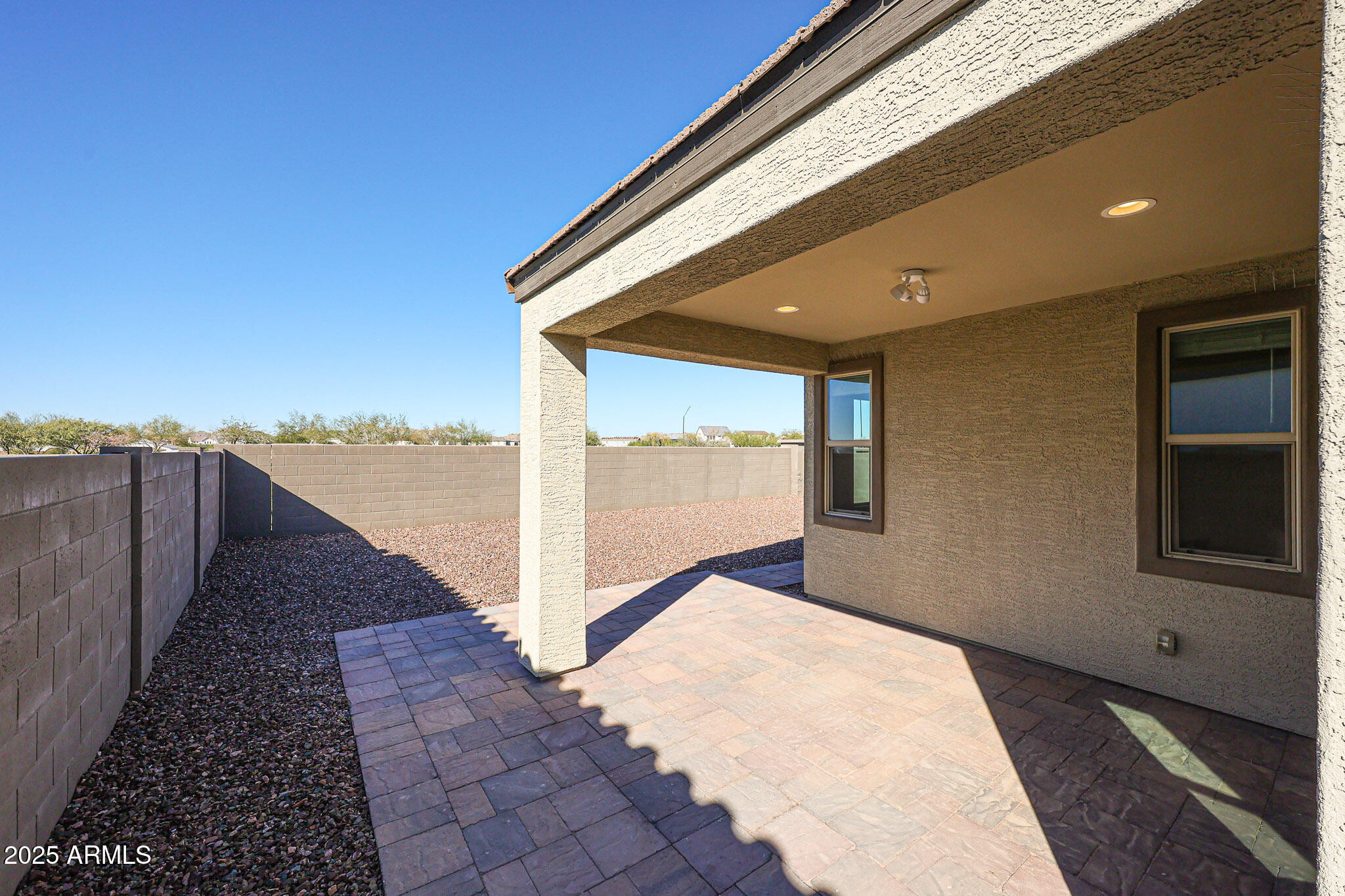 18062 West Amber Ridge Way Goodyear, AZ 85338 - Photo 37 of 67 a view of a building terrace with wooden floor